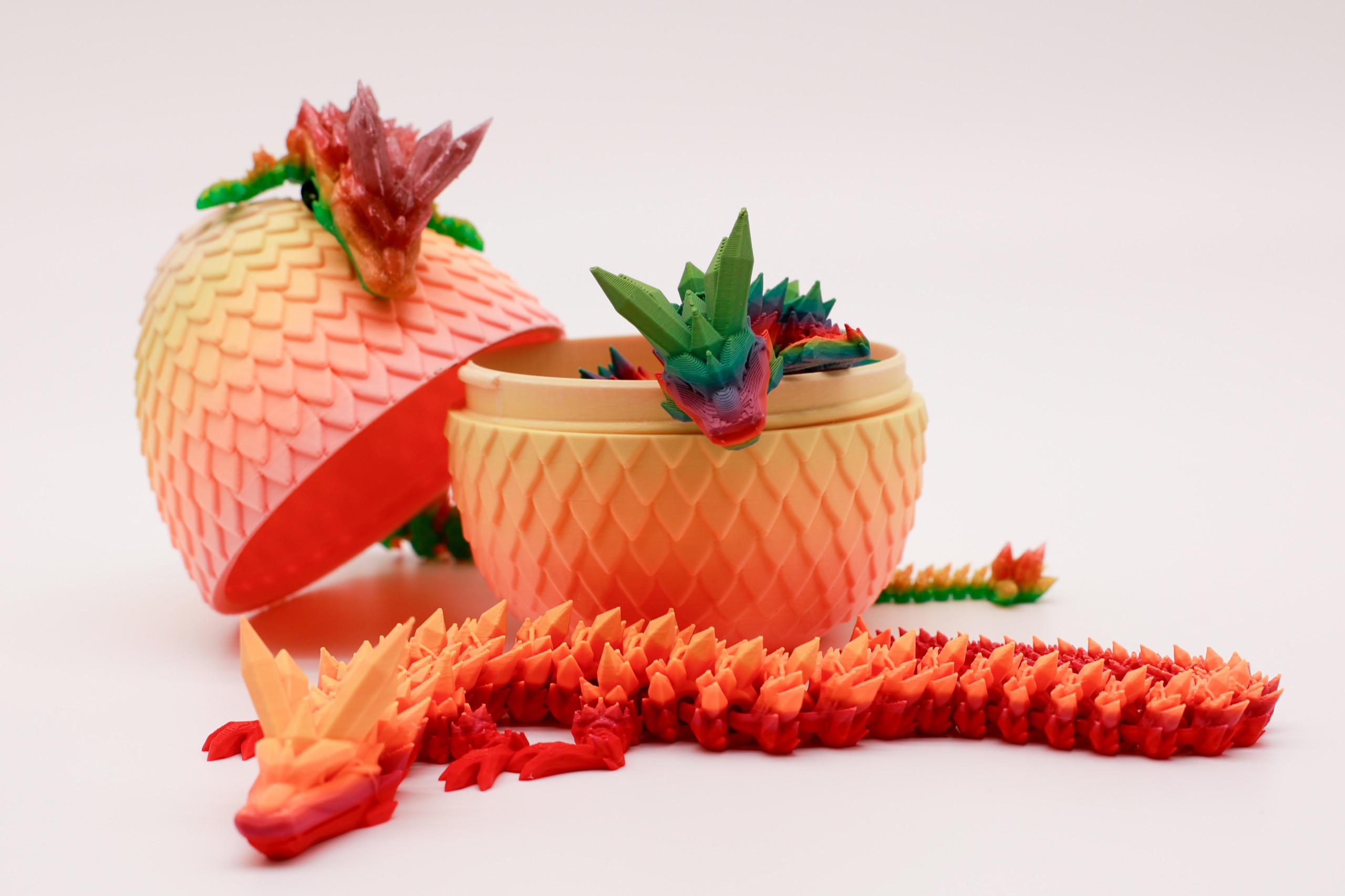 Dragon eggs surrounded by hatched baby dragons