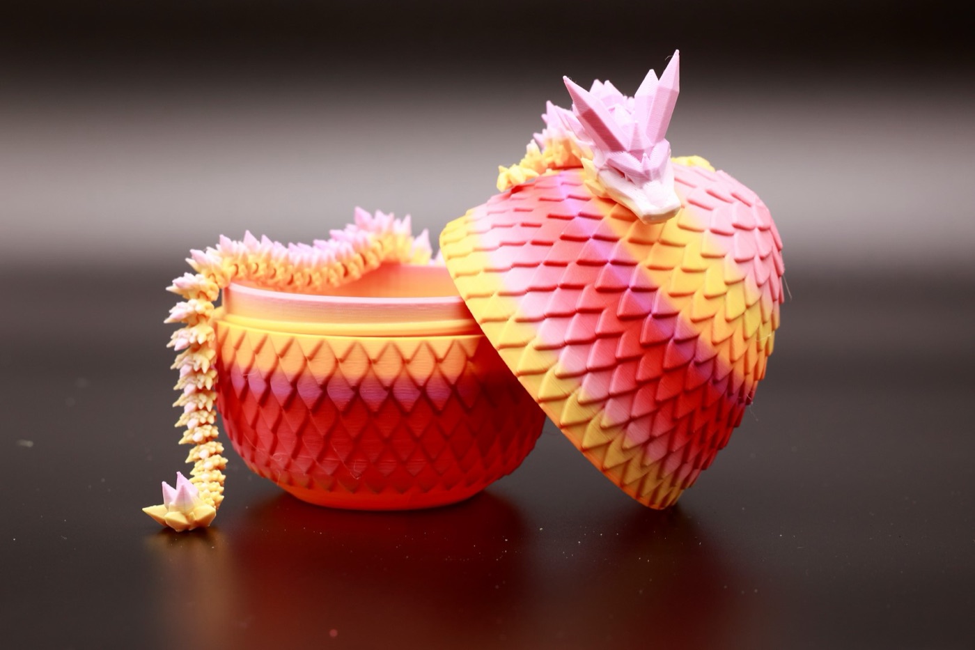 Peachy Sunrise egg opened with a surprise dragon inside